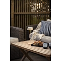 Konstsmide battery table lamp MENTON USB IP54, sand coloured, lacquered dimmable